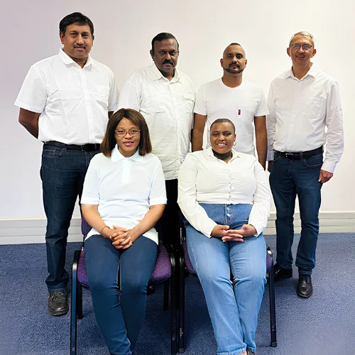 A company photograph of the team
