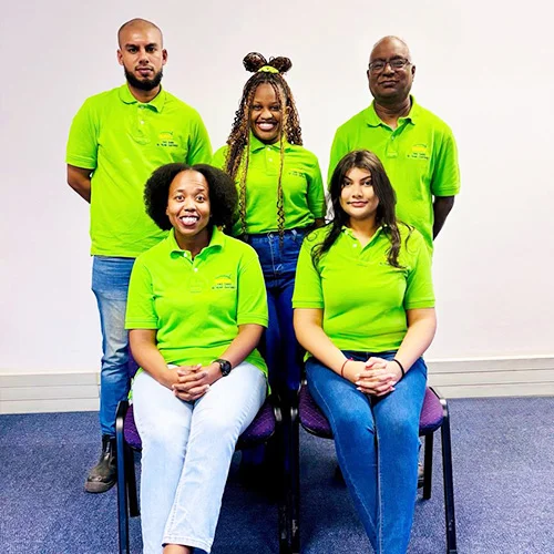 A company photograph of the team